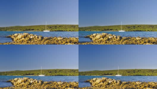 亚得里亚海上美丽的海湾天堂，在克罗地亚洛辛吉岛泻湖上的帆船高清在线视频素材下载