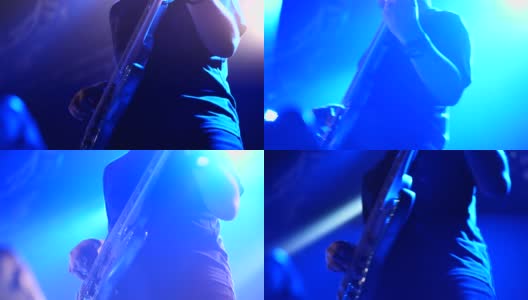在俱乐部的摇滚音乐会上演奏的吉他手高清在线视频素材下载