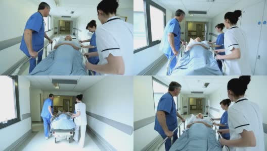 医护人员慢动作移动病人病床高清在线视频素材下载