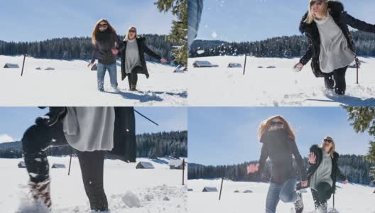 年轻姑娘们在冬天的风景里互相追逐高清在线视频素材下载