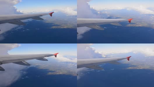 从飞机窗口看到的带有云的天空。高清在线视频素材下载