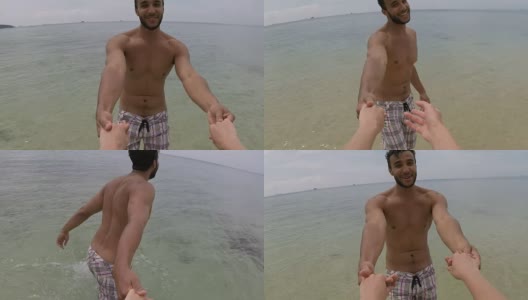 西班牙男子在海水里牵着手跑动作摄像机镜头高清在线视频素材下载