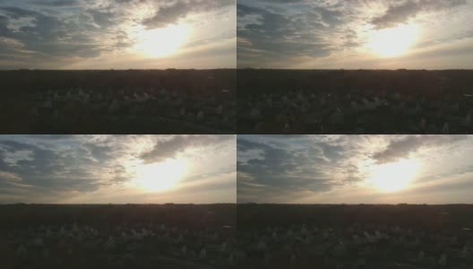 日落郊区的无人机镜头-前进高清在线视频素材下载
