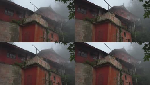 迷失在四川(中国)山区的小佛教寺院。寺庙被雾气覆盖高清在线视频素材下载