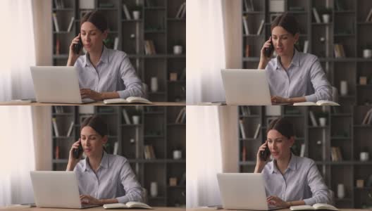 快乐的年轻35岁的女商人在电话上聊天，在电脑上工作。高清在线视频素材下载