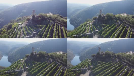 Ribeira Sacra，沿着希尔河的葡萄园种植梯田和葡萄收获者的贡品纪念碑高清在线视频素材下载