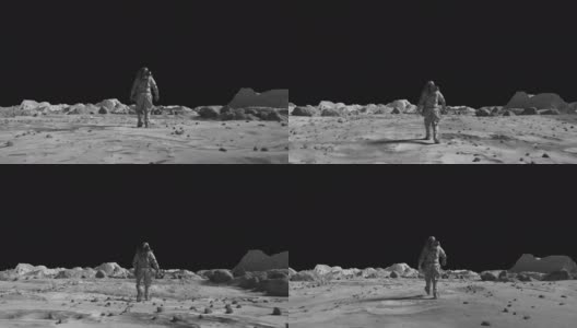 勇敢的宇航员穿着太空服自信地行走在月球表面的阿尔法通道。月球表面，散布着小岩石和沙子。飞越月球环形山。月球表面，沙漠，悬崖，沙子。覆盖在岩石。高清在线视频素材下载