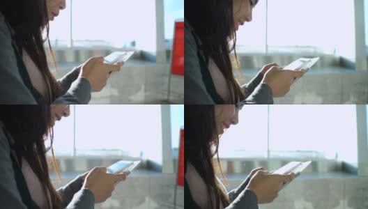 在机场休息室使用电话高清在线视频素材下载
