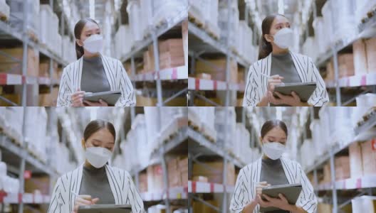 亚洲女企业主戴着口罩，用数码平板电脑检查库存产品库存数量在配送仓库工厂。物流业务运输和配送服务高清在线视频素材下载
