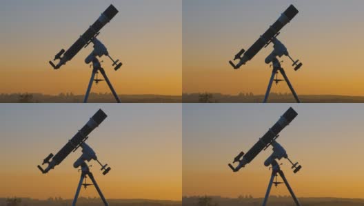 望远镜的轮廓和遥远的城市地平线。高清在线视频素材下载