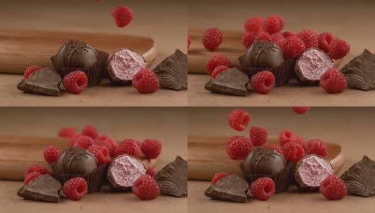 覆盆子松露巧克力，原料以慢动作落下。使用幻影Flex 4K相机拍摄。高清在线视频素材下载
