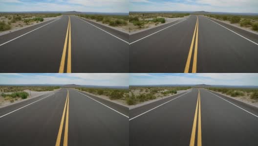 白天空旷的沙漠道路中间高清在线视频素材下载