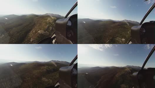 从直升机驾驶舱里看到的荒野景象高清在线视频素材下载