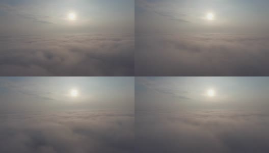 空中飞越云层，日出向前运动高清在线视频素材下载