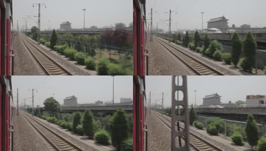 从移动的火车来看西安城墙，陕西西安，中国。高清在线视频素材下载