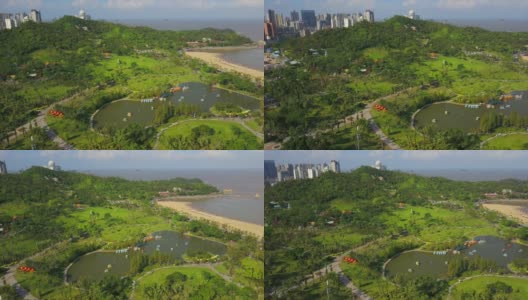 晴朗的一天，珠海市内著名的景山公园，城市景观航拍全景4k中国高清在线视频素材下载