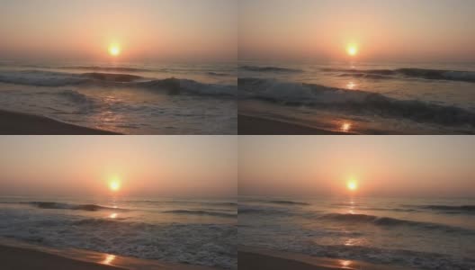 平静海洋上的日出。大西洋清晨的日出。海面上的日出景观。海滩上金色的日出。海洋的日出。海面上的日出景观。海滩上金色的日出。橙色的日出。高清在线视频素材下载