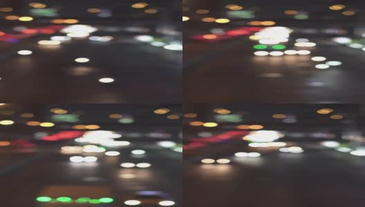 不对焦的背景与模糊的无聚焦的城市灯光散景和驾驶汽车和汽车灯。高清在线视频素材下载