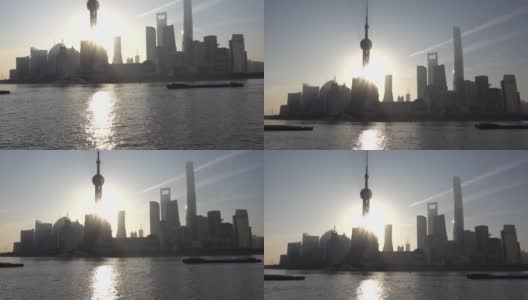 清晨日出和阳光背后的上海东方明珠塔天际线，中国上海。倾斜了拍摄高清在线视频素材下载