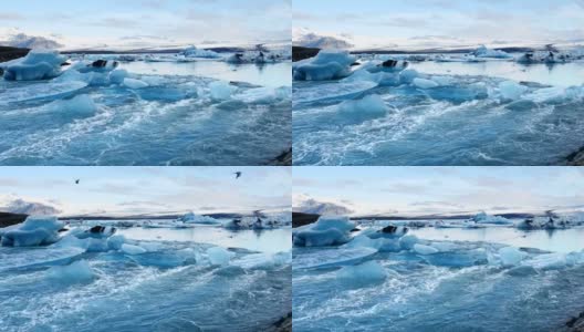 冰岛黑色火山海滩上的冰川高清在线视频素材下载
