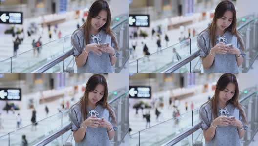亚洲游客在机场使用电话高清在线视频素材下载