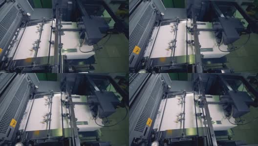 纸生产机器。二次资源的处理。印刷厂有特殊设备。高清在线视频素材下载