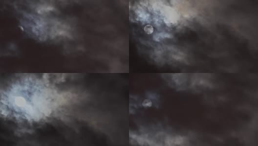 满月在多云的天空，夜间飞越云高清在线视频素材下载