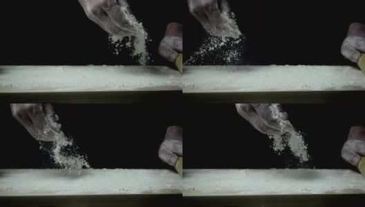 厨师用手慢动作倒面粉高清在线视频素材下载