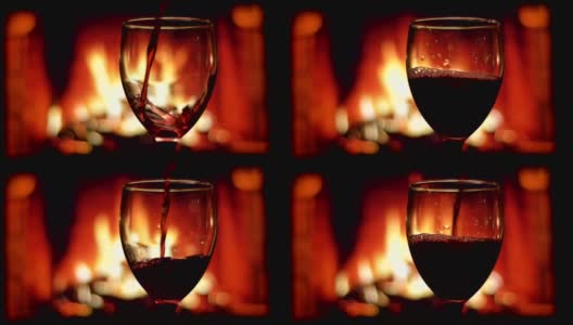 红酒被倒进豪华的空杯子与舒适温暖的壁炉在一个黑暗的公寓室内背景的特写拍摄高清在线视频素材下载