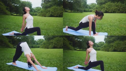 瑜伽教练在公园里从眼镜蛇姿势转变为向下的狗姿势高清在线视频素材下载
