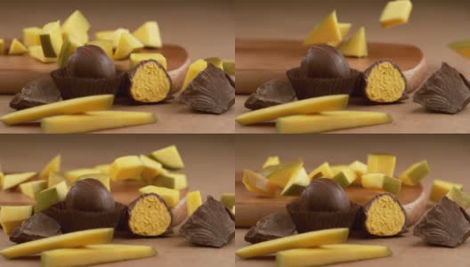 芒果巧克力松露，原料以慢动作落下。使用幻影Flex 4K相机拍摄。高清在线视频素材下载