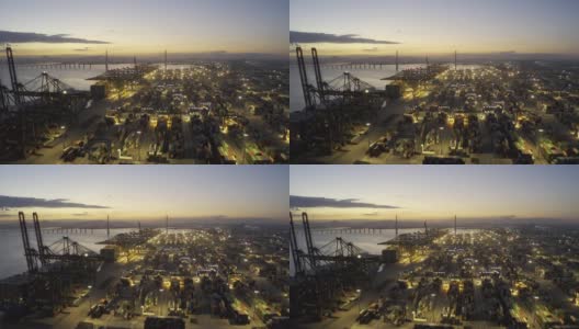 日落之后，灯火通明的大型商港码头依然繁忙高清在线视频素材下载