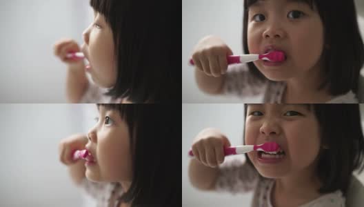 亚洲女孩喜欢她的刷牙程序高清在线视频素材下载