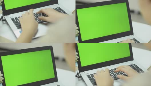 过肩平移:女性正在使用笔记本电脑高清在线视频素材下载