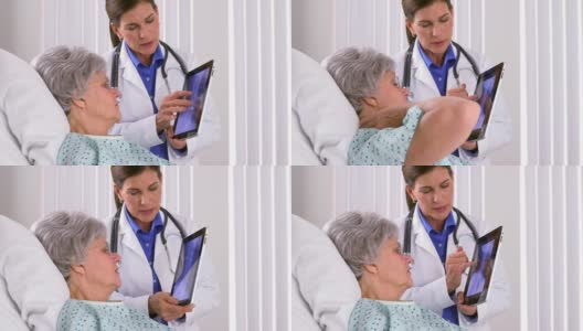 医生向老病人解释x光高清在线视频素材下载