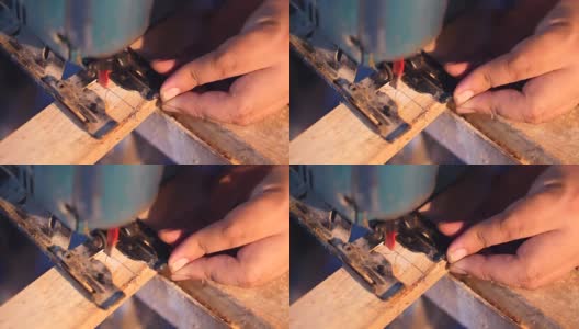 木工在车间用锯切割机切割木梁高清在线视频素材下载