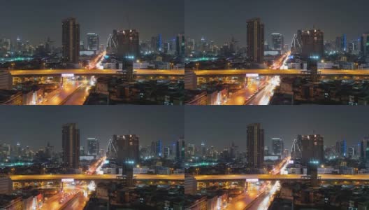 曼谷市区与汽车交通的交叉口鸟瞰图的延时。泰国。金融区在智慧城市与科技城市。摩天大楼的夜晚高清在线视频素材下载