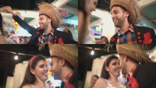 巴西年轻夫妇跳舞在一个arrayina，朱尼纳派对高清在线视频素材下载