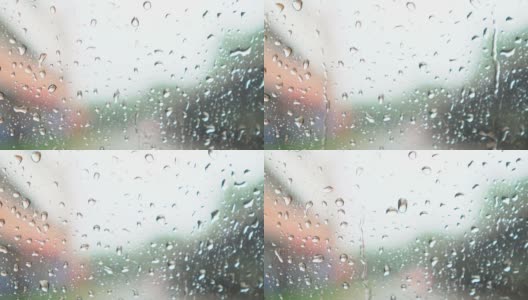 大雨和雨点打在窗户上高清在线视频素材下载