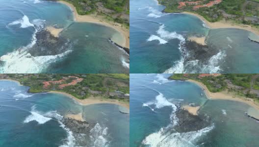 无人机拍摄的poipu海滩海岸线科罗亚夏威夷高清在线视频素材下载
