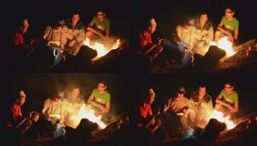 篝火旁的男孩之夜高清在线视频素材下载