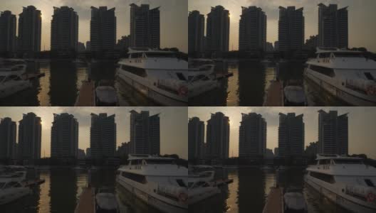 日落时分三亚市湾游艇码头大桥慢镜头全景4k中国海南高清在线视频素材下载