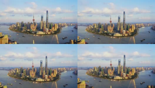 无人机拍摄:实时，向上，4K鸟瞰日落时的上海天际线，中国。高清在线视频素材下载
