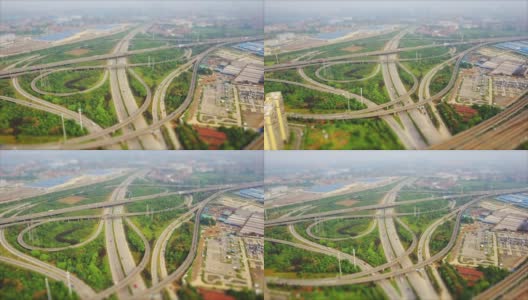 白天武汉市车流交接处空中全景4k倾斜移位中国高清在线视频素材下载