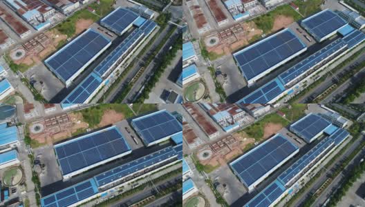 太阳能光伏在工厂屋顶建筑上的航拍照片高清在线视频素材下载