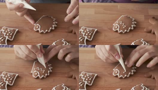 用圆锥体用白色糖霜装饰自制的姜饼圣诞饼干，形状像刺猬高清在线视频素材下载