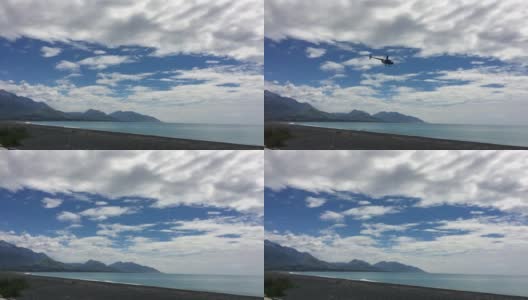 直升机在凯库拉海滩上空高清在线视频素材下载