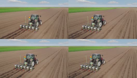 无人机拍摄的农民用拖拉机播种作物高清在线视频素材下载