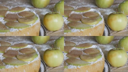 新鲜出炉的美味苹果派夏洛特绿苹果背景。传统的自制苹果肉桂派高清在线视频素材下载