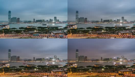 中国香港，2014年11月12日:中国香港，维多利亚湾海港附近的交通和建筑的夜景高清在线视频素材下载